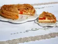 Rustico leccese con sfoglia dorata e ripieno cremoso di ricotta e pomodorini. Un assaggio di Puglia.